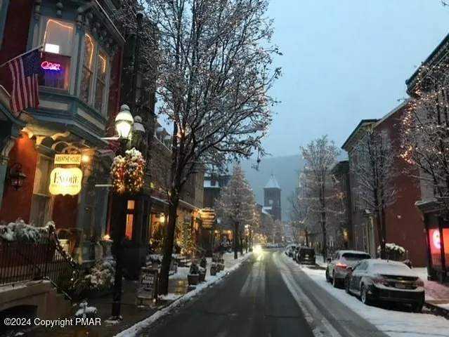 a view of a city street from a building
