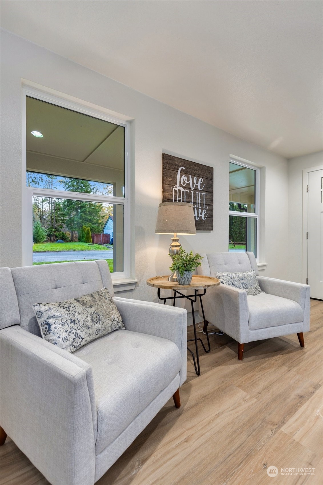 17728 28th Avenue Southeast Bothell, WA 98012 - Photo 11 of 40 a living room with furniture and a large window