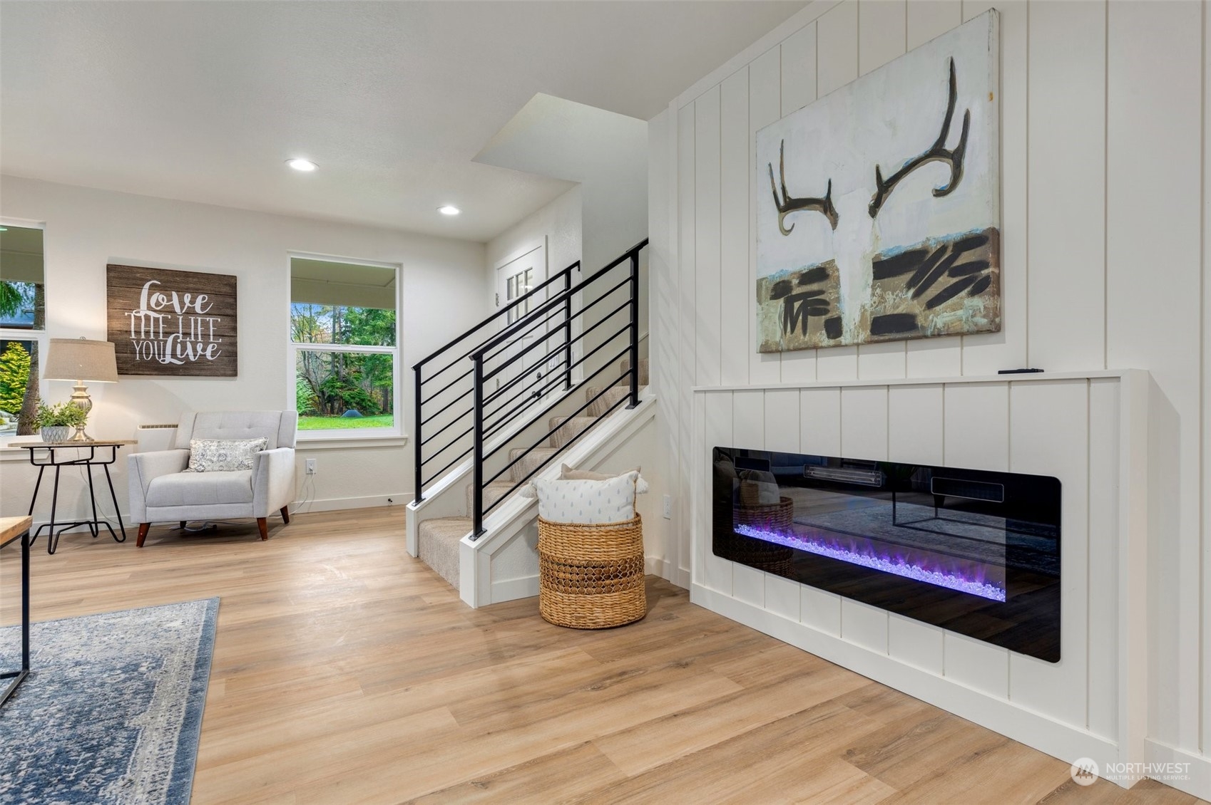 17728 28th Avenue Southeast Bothell, WA 98012 - Photo 13 of 40 a living room with furniture and a fireplace