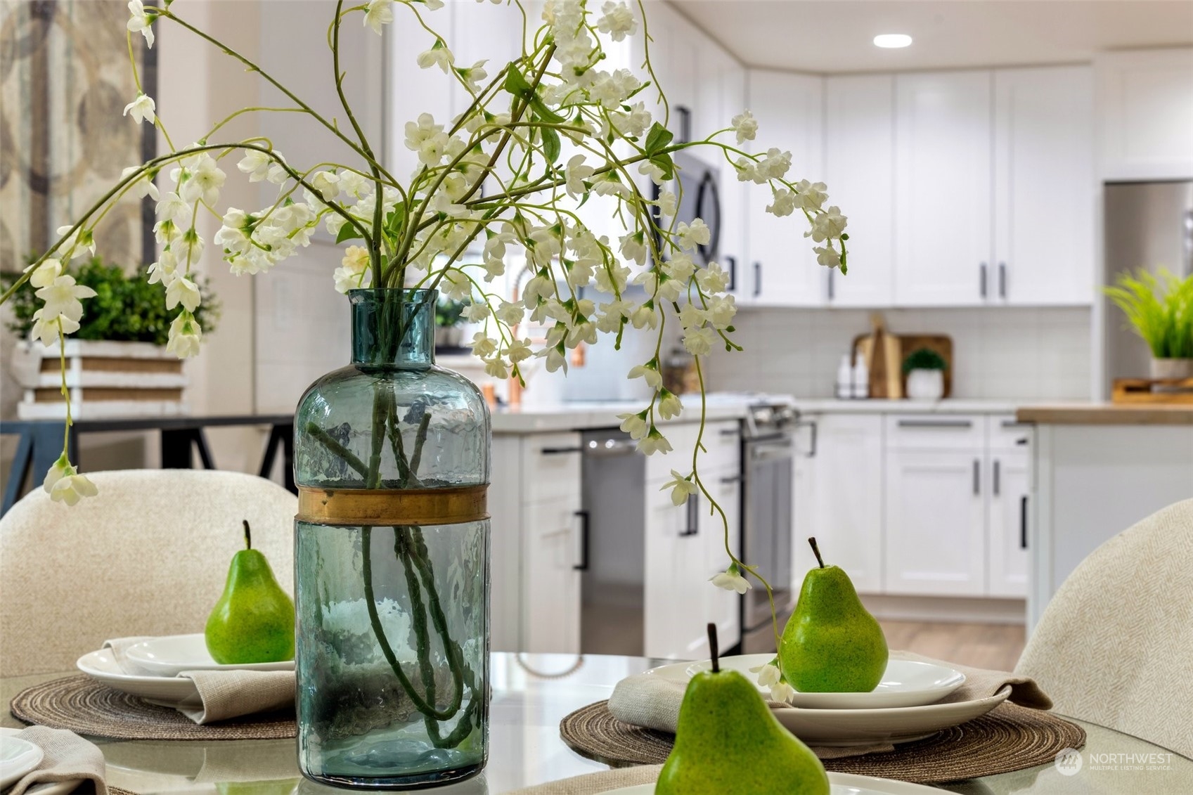 17728 28th Avenue Southeast Bothell, WA 98012 - Photo 20 of 40 a living room with furniture and a chandelier