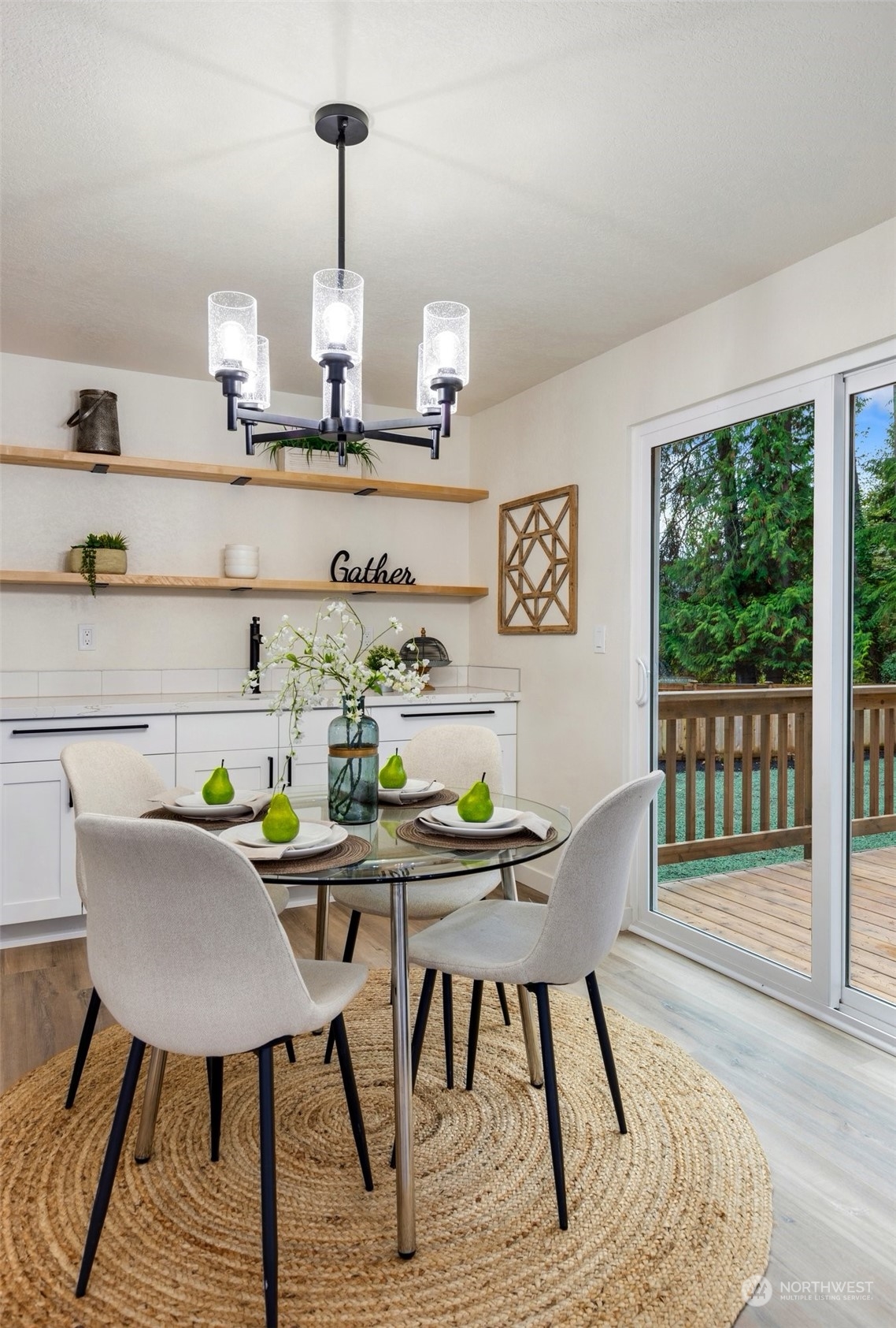 17728 28th Avenue Southeast Bothell, WA 98012 - Photo 22 of 40 a view of a dining room with furniture window and wooden floor