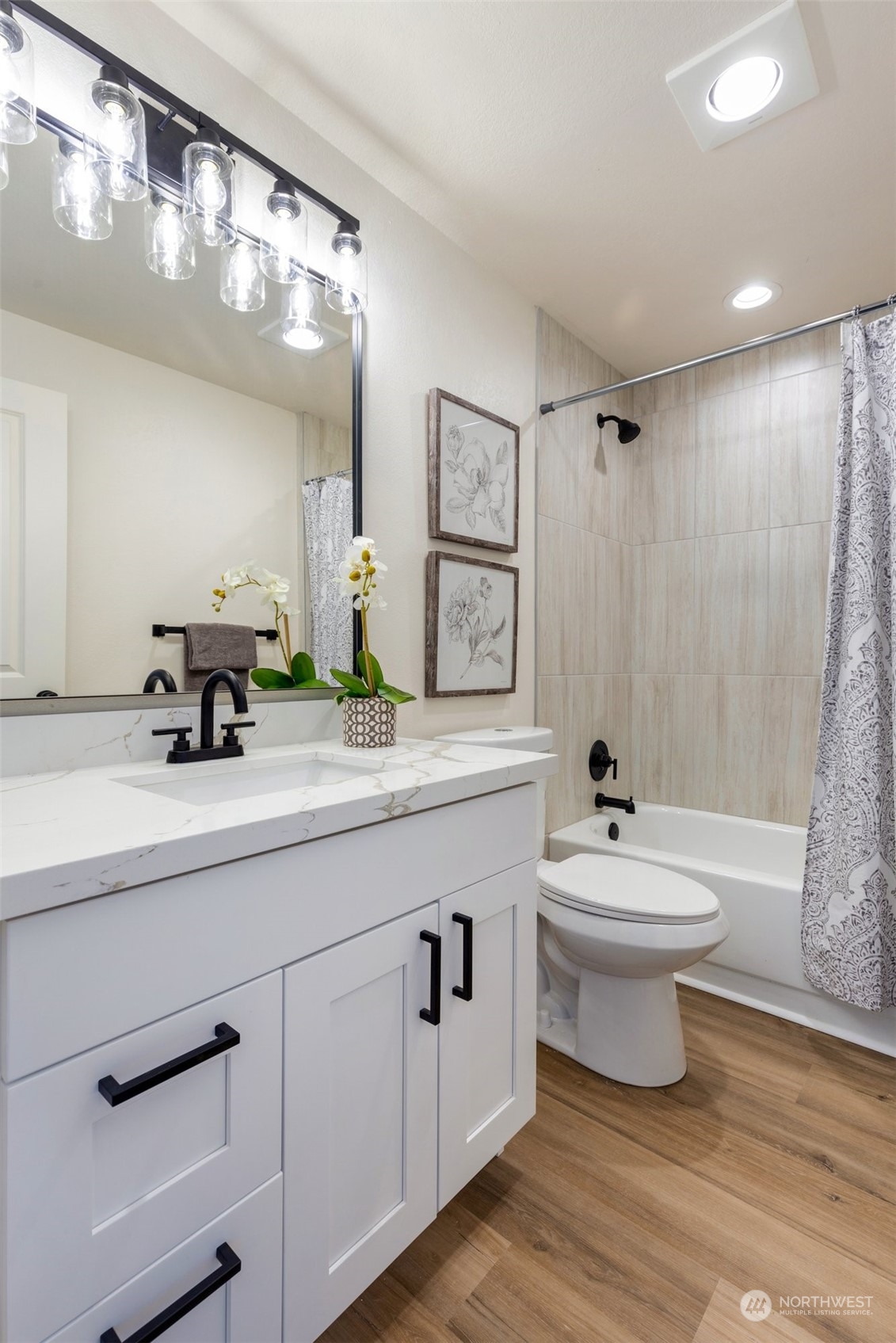 17728 28th Avenue Southeast Bothell, WA 98012 - Photo 29 of 40 a bathroom with a double vanity sink and a bathtub