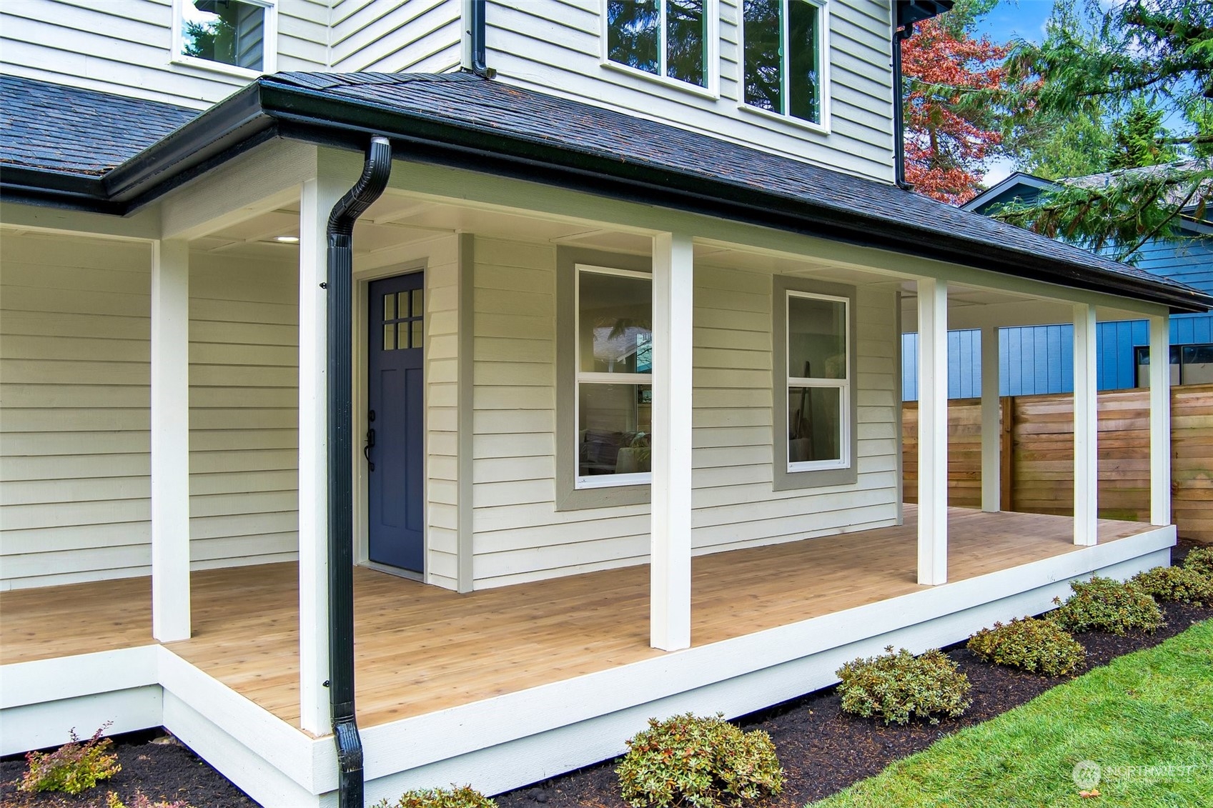 17728 28th Avenue Southeast Bothell, WA 98012 - Photo 3 of 40 a view of a house with small yard plants and large tree