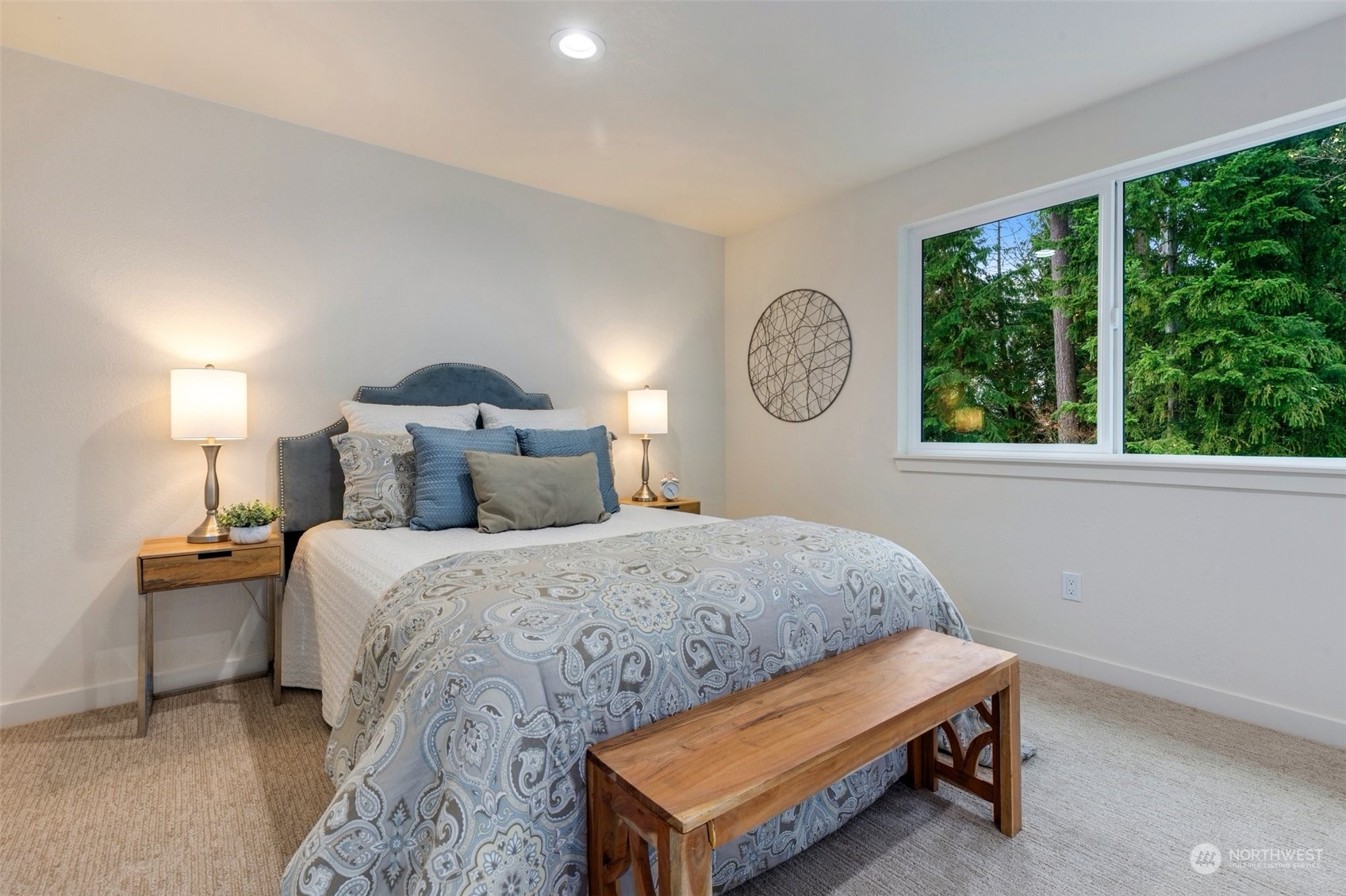 17728 28th Avenue Southeast Bothell, WA 98012 - Photo 32 of 40 a bedroom with a bed a window and a lamp