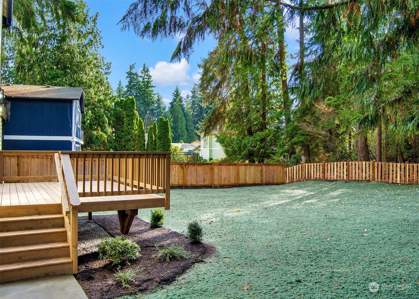 17728 28th Avenue Southeast Bothell, WA 98012 - Photo 38 of 40 a view of a backyard with a garden