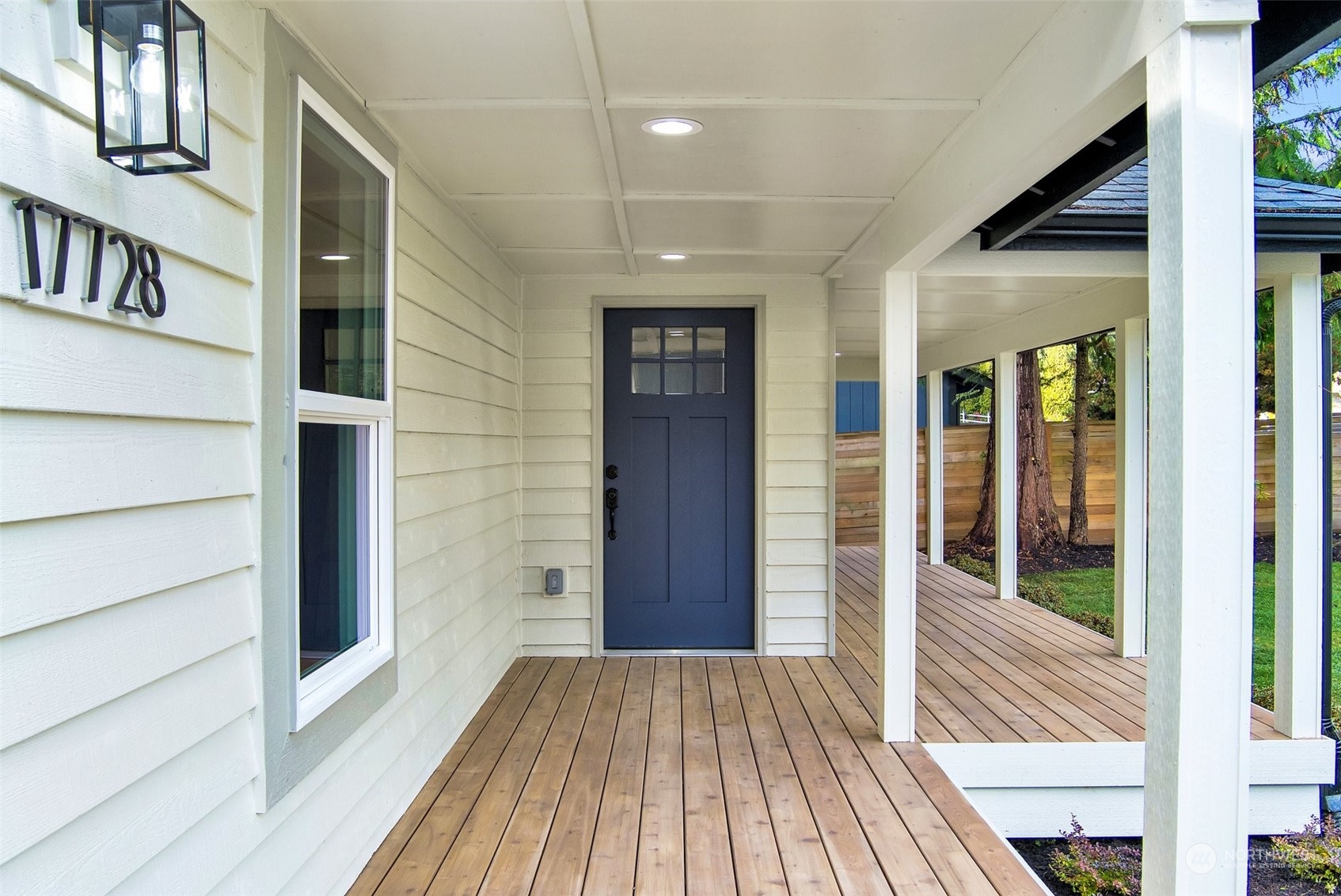 17728 28th Avenue Southeast Bothell, WA 98012 - Photo 6 of 40 a view of a hallway with wooden floor and windows