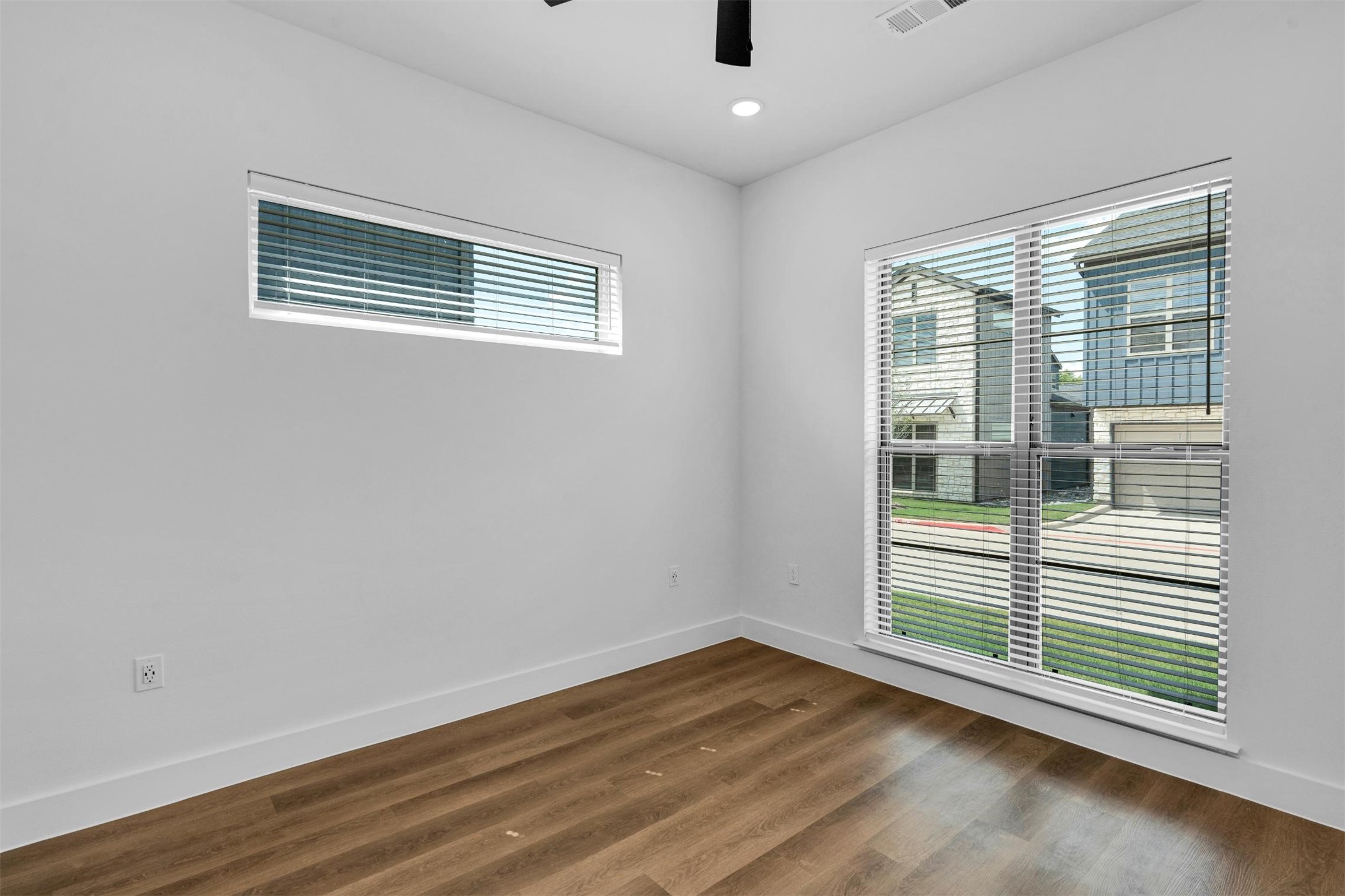 1848-812 Labrador Lane Garland, TX 75040 - Photo 17 of 38 a view of a livingroom with wooden floor and a window