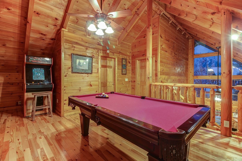 2010 Goose Gap Road Sevierville, TN 37876 - Photo 23 of 33 a view of a balcony with a table and chairs