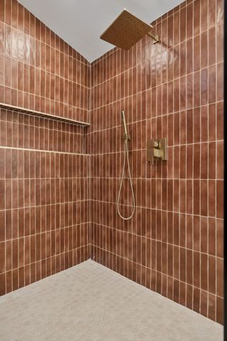 a blue bathroom with blue walls and blue walls