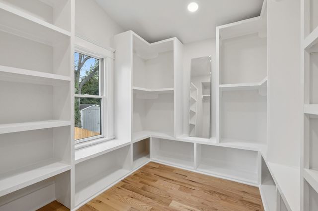 a view of an empty walk in closet