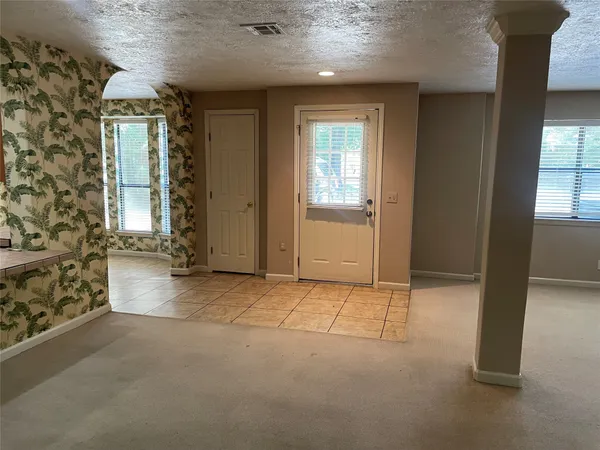 an empty room with windows