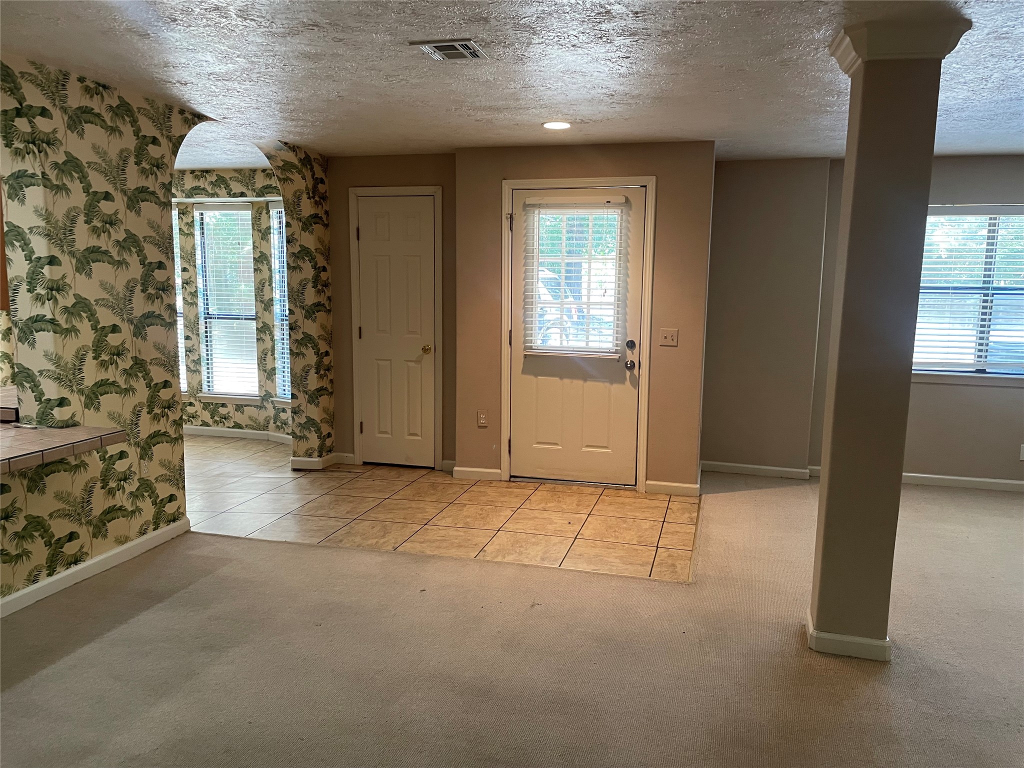 302 Somerset Conroe, TX 77316 - Photo 3 of 22 an empty room with windows