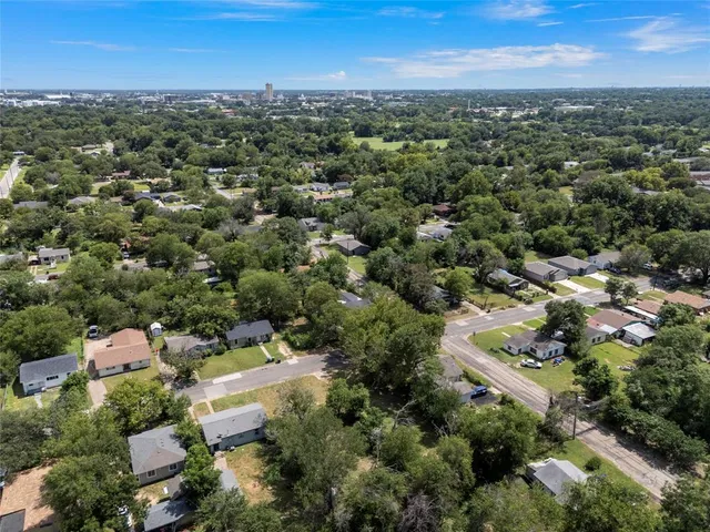 an aerial view of a city with lots of residential buildings