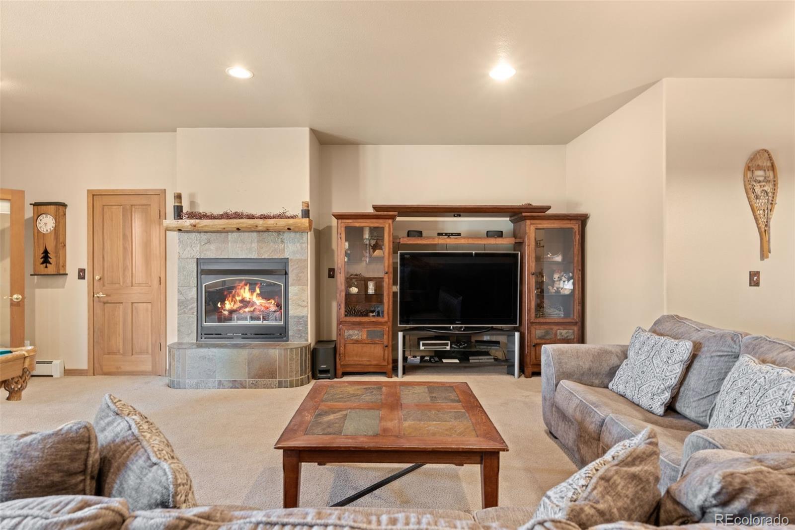 92 Emmett Lode Road, Unit B Breckenridge, CO 80424 - Photo 26 of 50 a living room with furniture and a flat screen tv