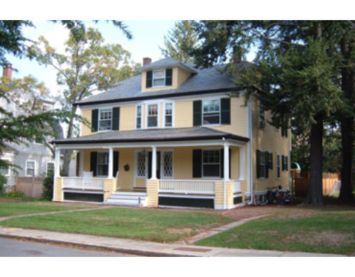 14 Upland Road Wellesley, MA 02482 - Photo 1 of 1 a white house that has a tree in front of it