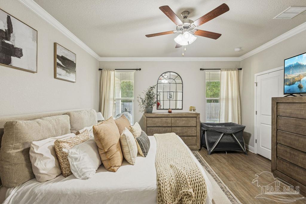 5392 Parkside Drive Pace, FL 32571 - Photo 15 of 28 a living room with furniture and a large window