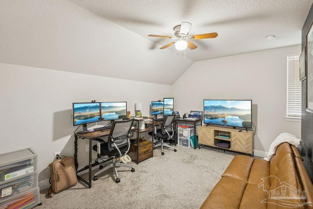 5392 Parkside Drive Pace, FL 32571 - Photo 23 of 28 a view of a livingroom with workspace and a window