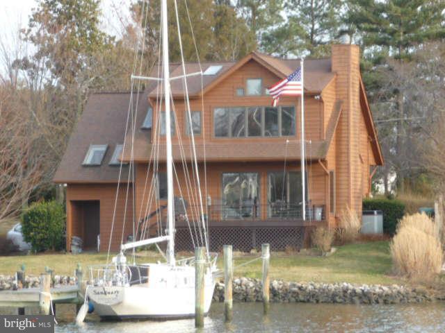 1201 Rogers Road Edgewater, MD 21037 - Photo 1 of 30 a front view of a house with fountain