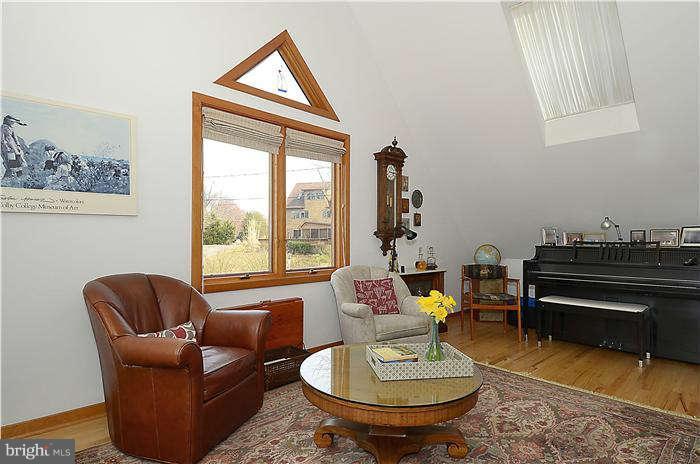 1201 Rogers Road Edgewater, MD 21037 - Photo 11 of 30 a living room with furniture a rug and a window