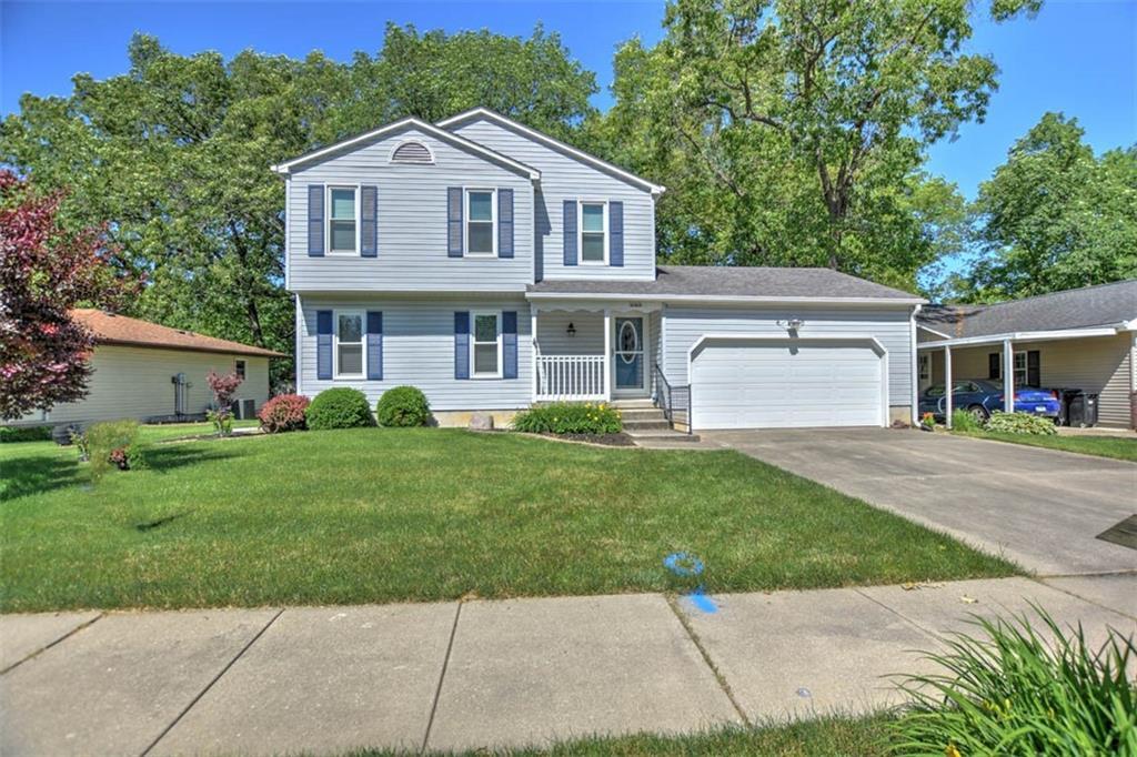 983 South Cedar Hill Drive Decatur, IL 62521 - Photo 1 of 1 a front view of a house with a garden