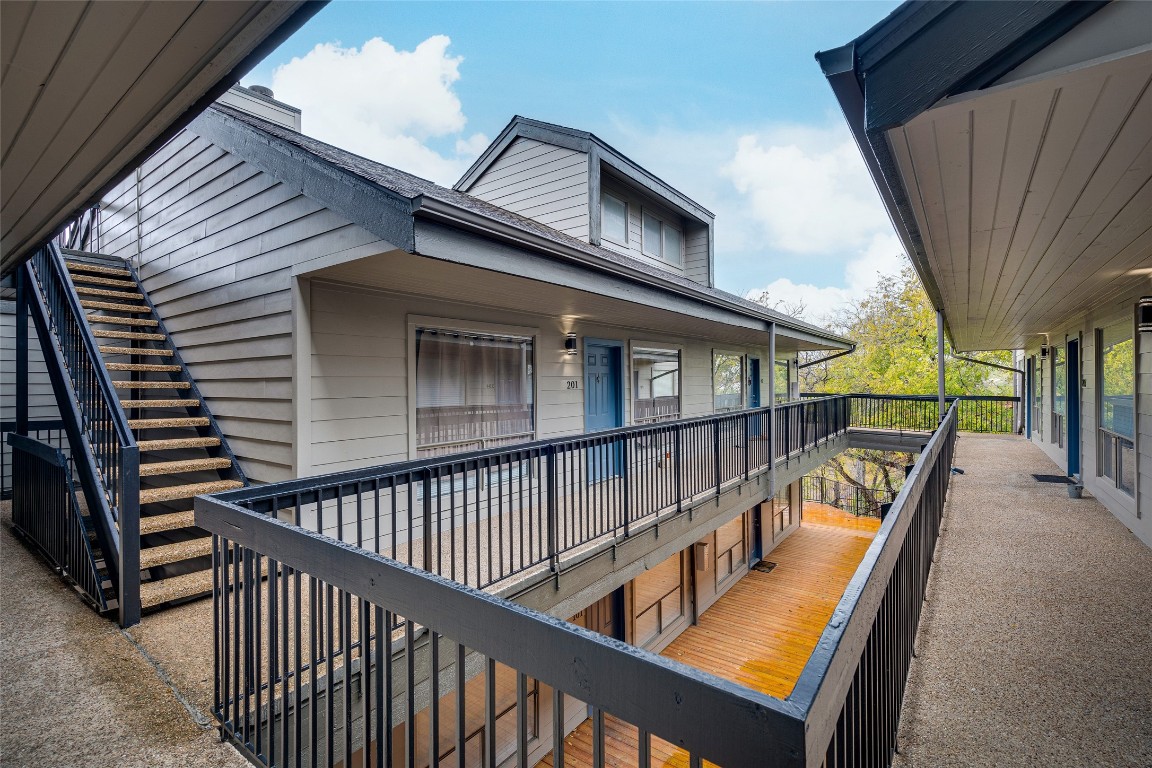 908 Poplar Street, Unit 208 Austin, TX 78705 - Photo 2 of 26 a view of a balcony with chairs