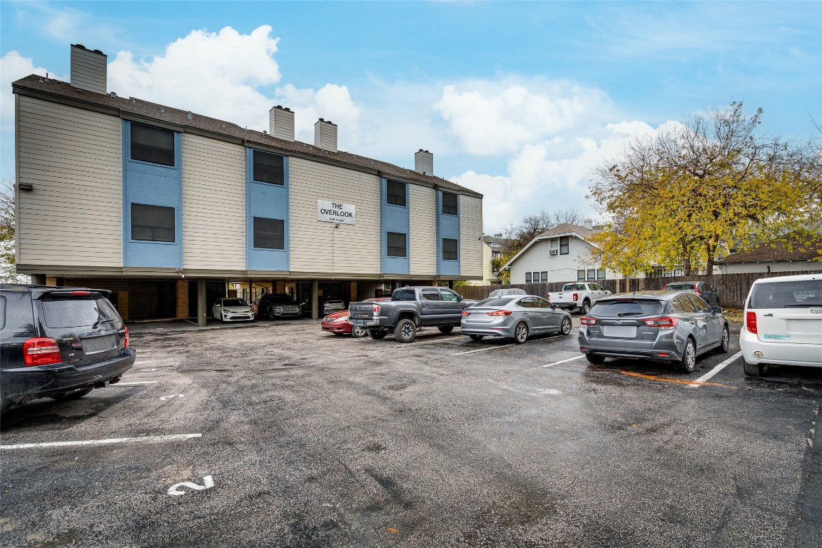 908 Poplar Street, Unit 208 Austin, TX 78705 - Photo 26 of 26 a view of cars parked in front of a house