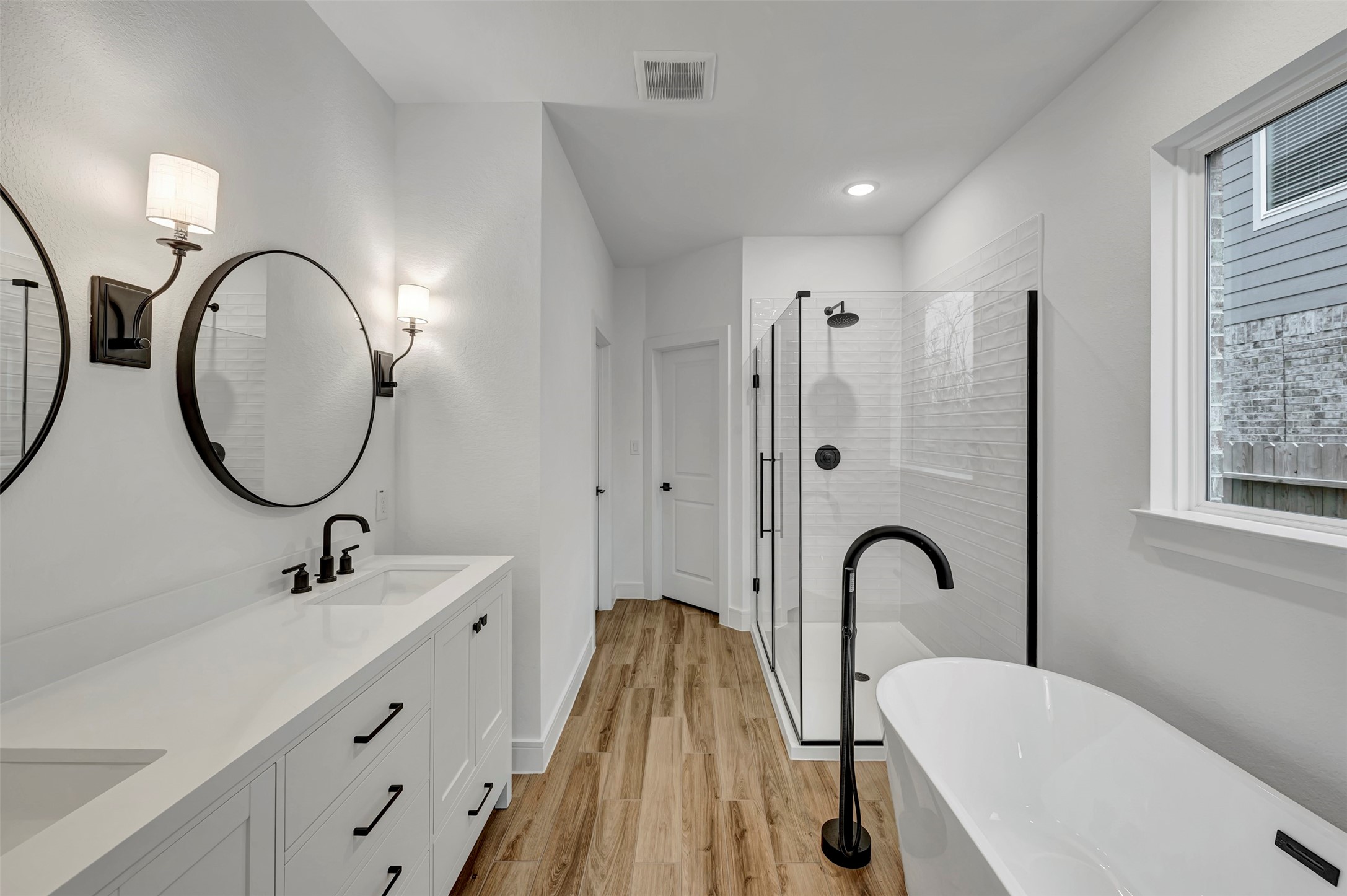 2819 Duchess Drive Rosenberg, TX 77471 - Photo 14 of 37 a spacious bathroom with a double vanity sink a mirror and shower