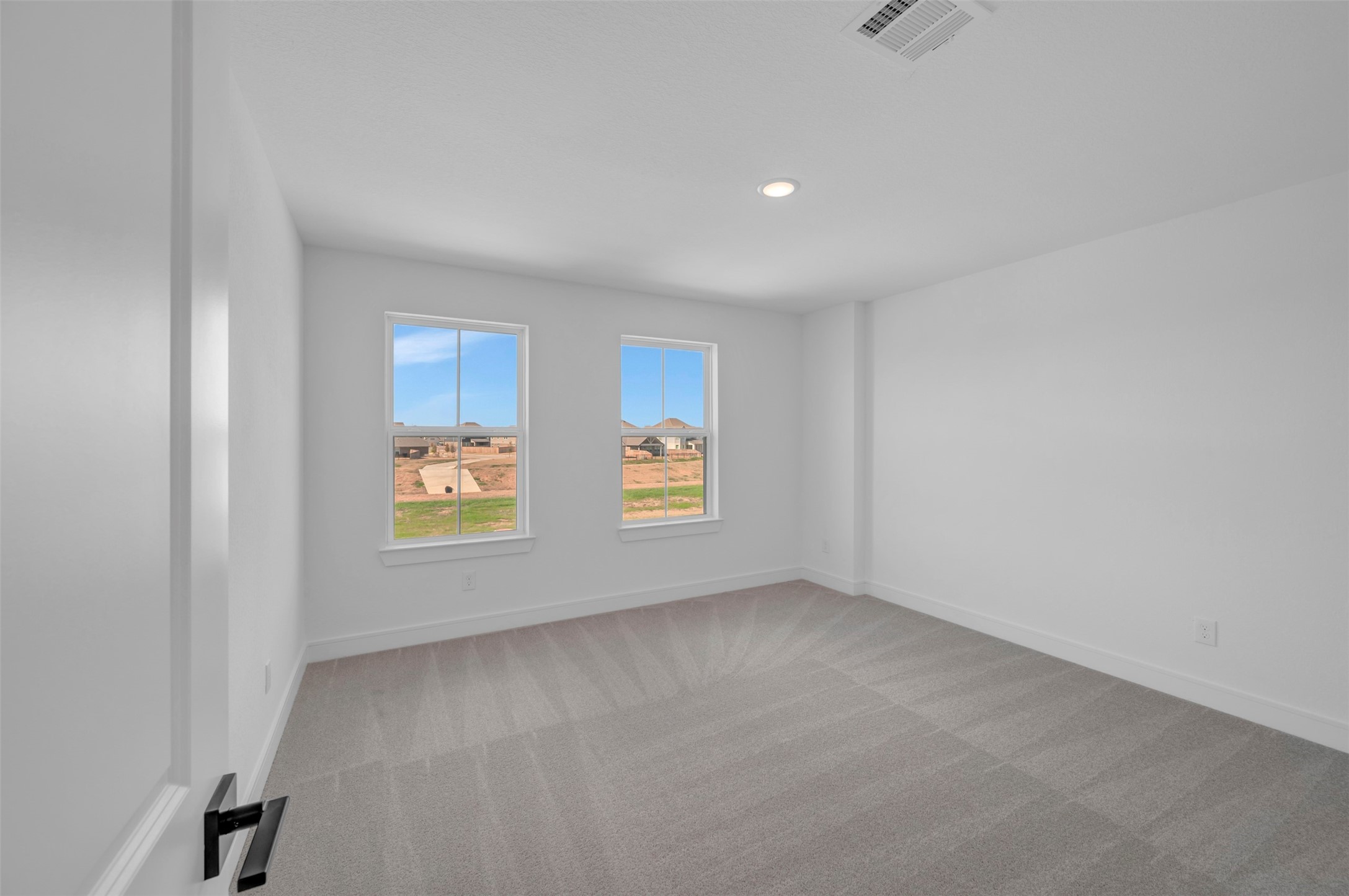 2819 Duchess Drive Rosenberg, TX 77471 - Photo 20 of 37 an empty room with windows