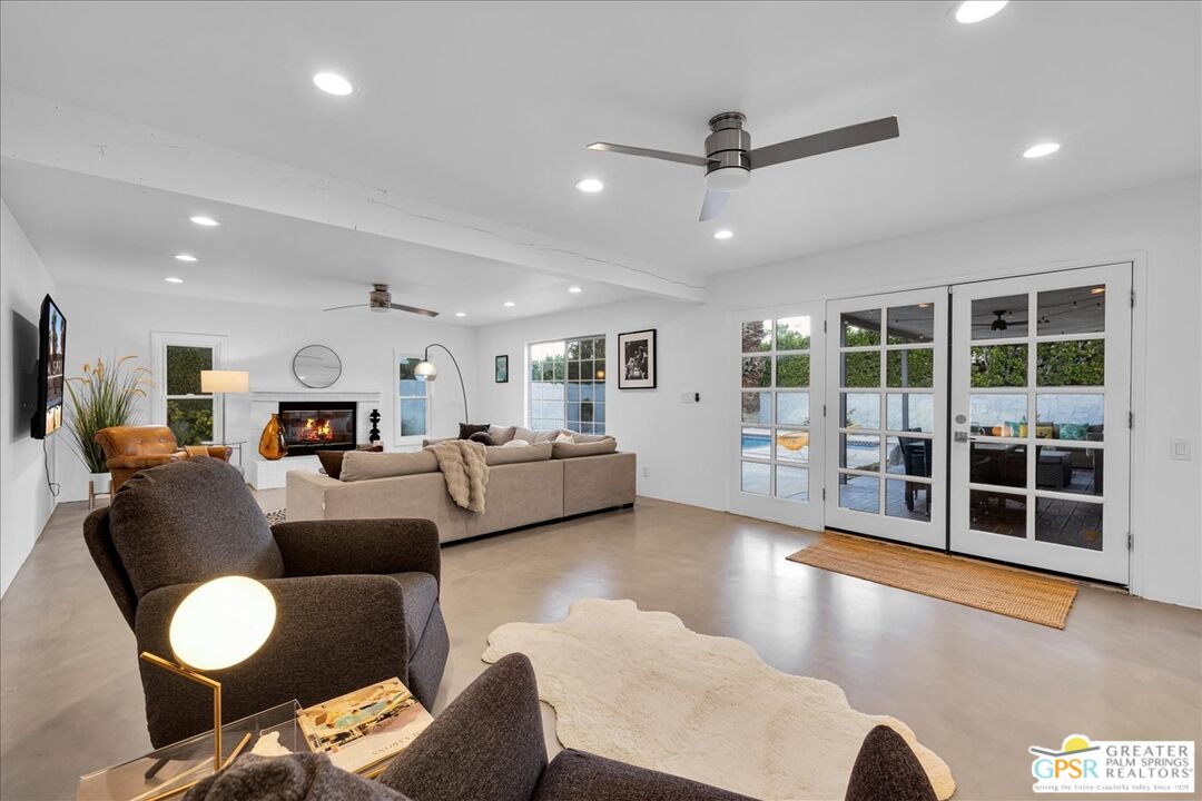 2210 East Powell Road Palm Springs, CA 92262 - Photo 21 of 71 a living room with furniture and a table