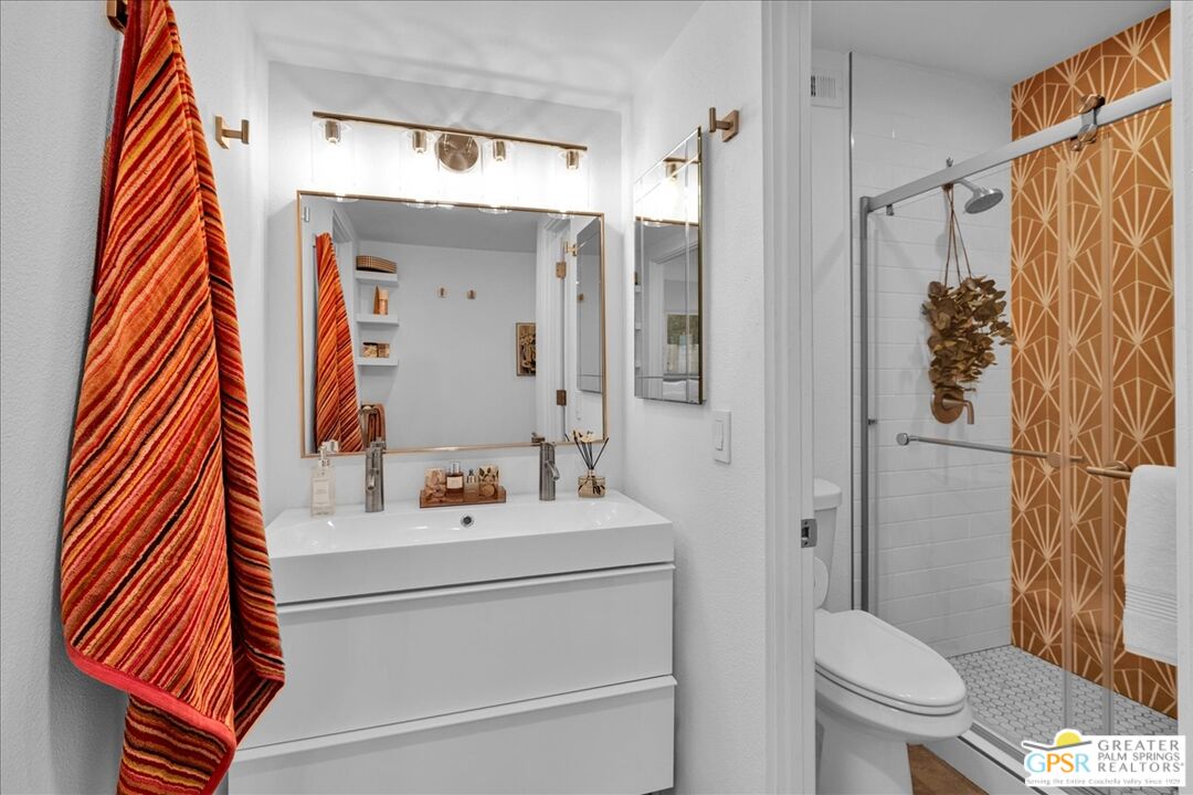 2210 East Powell Road Palm Springs, CA 92262 - Photo 33 of 71 a bathroom with a sink a toilet and shower