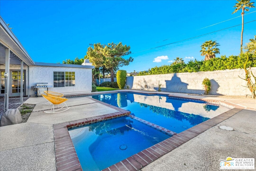 2210 East Powell Road Palm Springs, CA 92262 - Photo 43 of 71 a view of swimming pool with chairs