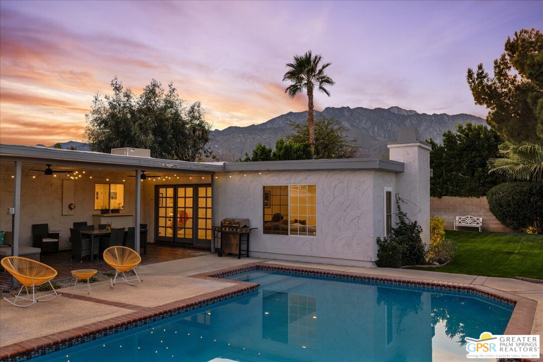 2210 East Powell Road Palm Springs, CA 92262 - Photo 46 of 71 a house view with a sitting space garden view with a potted plant