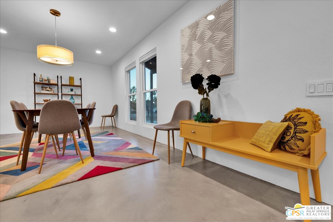 2210 East Powell Road Palm Springs, CA 92262 - Photo 5 of 71 a living room with furniture and a wooden floor