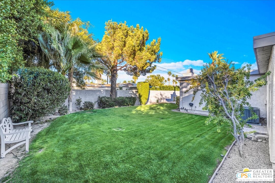 2210 East Powell Road Palm Springs, CA 92262 - Photo 60 of 71 a backyard of a house with lots of green space