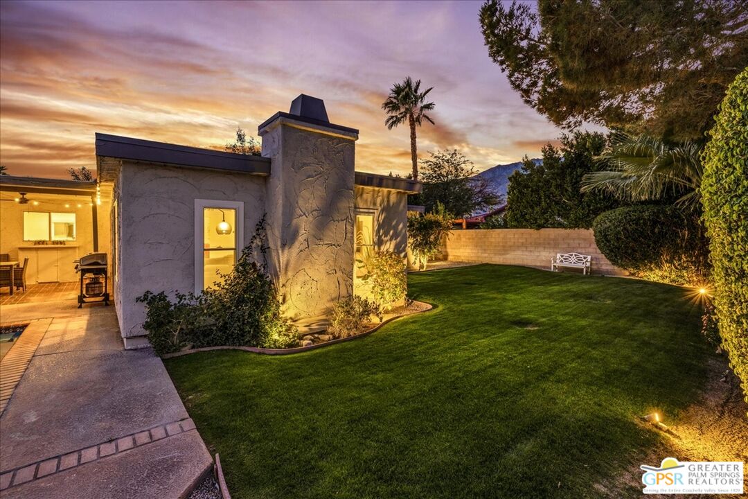 2210 East Powell Road Palm Springs, CA 92262 - Photo 63 of 71 a front view of a house with garden