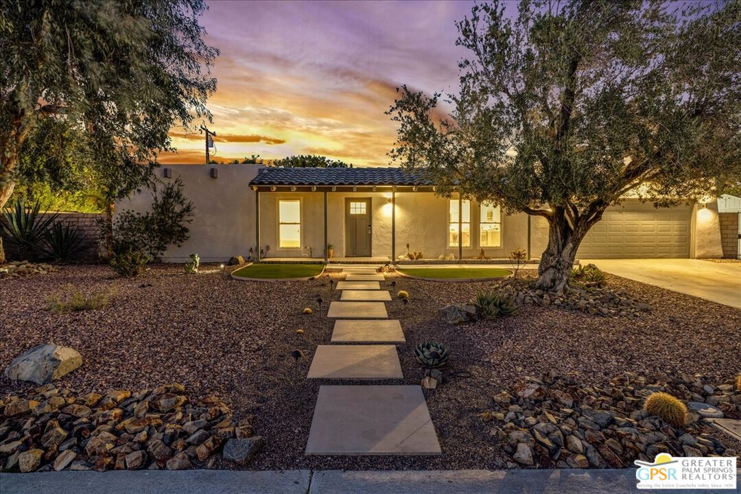 2210 East Powell Road Palm Springs, CA 92262 - Photo 65 of 71 a front view of a house with a yard