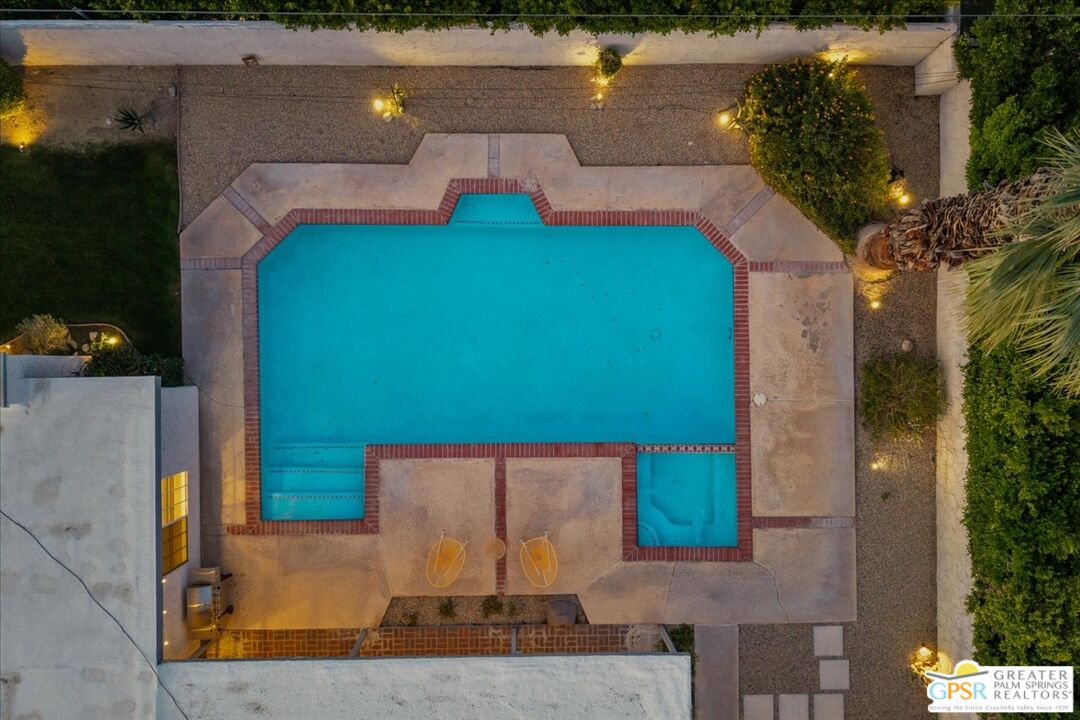 2210 East Powell Road Palm Springs, CA 92262 - Photo 71 of 71 an aerial view of a house with a yard and lake view