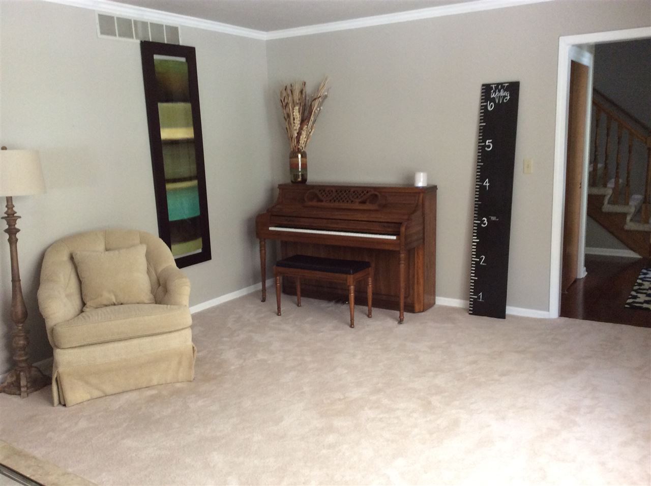 7169 Sentinel Road Rockford, IL 61107 - Photo 2 of 25 a living room with furniture and a piano