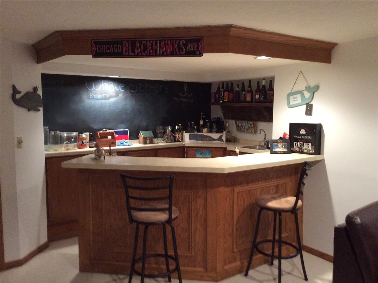 7169 Sentinel Road Rockford, IL 61107 - Photo 22 of 25 a kitchen with a sink cabinets and wooden floor