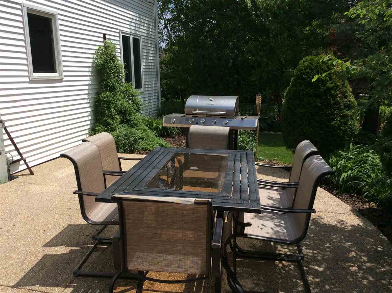 7169 Sentinel Road Rockford, IL 61107 - Photo 23 of 25 a view of a chairs and table in patio