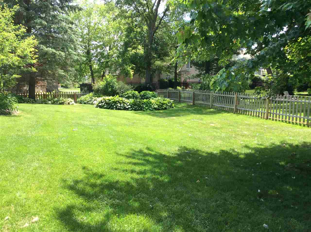 7169 Sentinel Road Rockford, IL 61107 - Photo 25 of 25 a view of a backyard with large trees