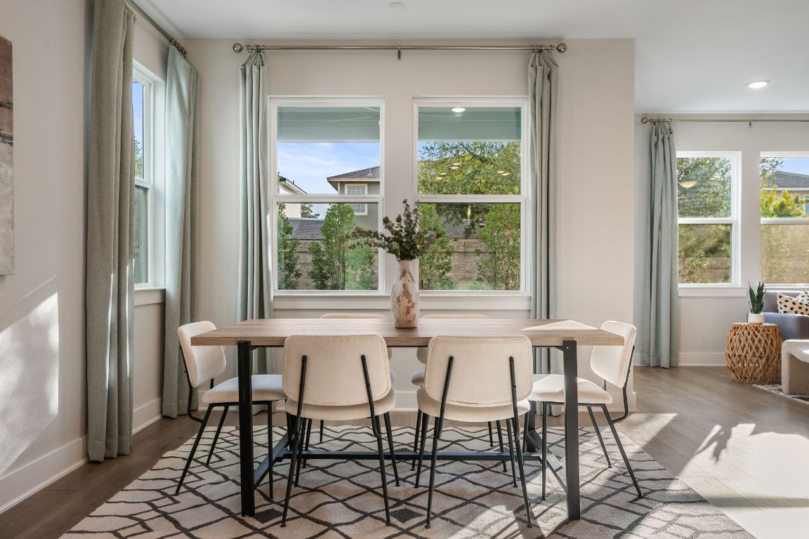 1403 Iberville Drive Pflugerville, TX 78660 - Photo 16 of 40 a view of a dining room with furniture window and outside view