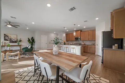 a view of a dining room with furniture
