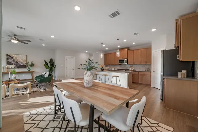 a view of a dining room with furniture