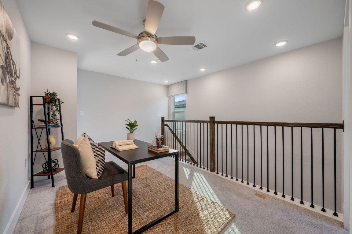 1403 Iberville Drive Pflugerville, TX 78660 - Photo 22 of 40 a view of a dining room with furniture