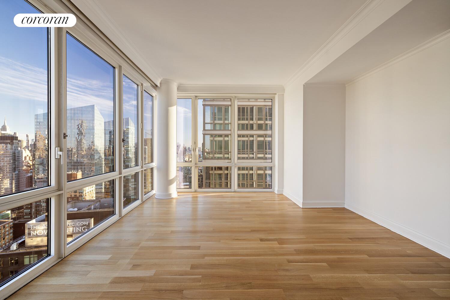 80 Riverside Boulevard, Unit 36B Manhattan, NY 10069 - Photo 11 of 25 a view of an empty room with wooden floor and a window