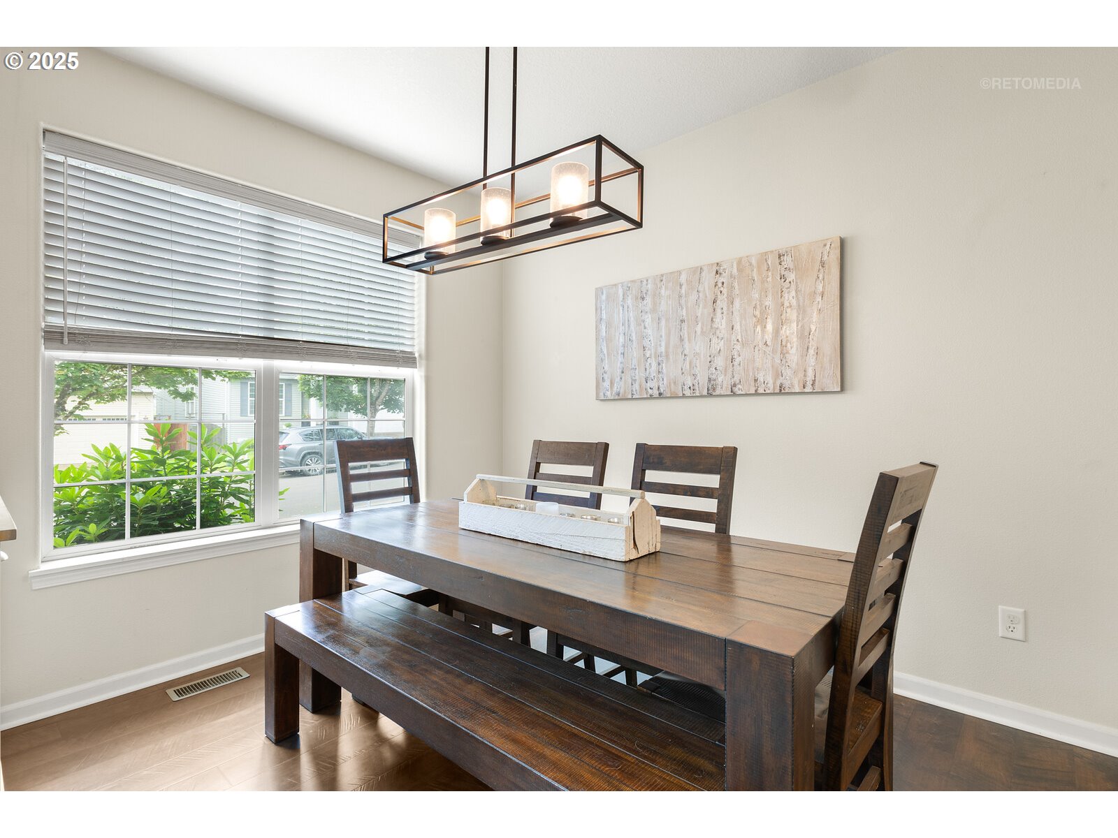 20102 Southwest 54th Terrace Tualatin, OR 97062 - Photo 12 of 35 a view of a dining room with a table and chairs