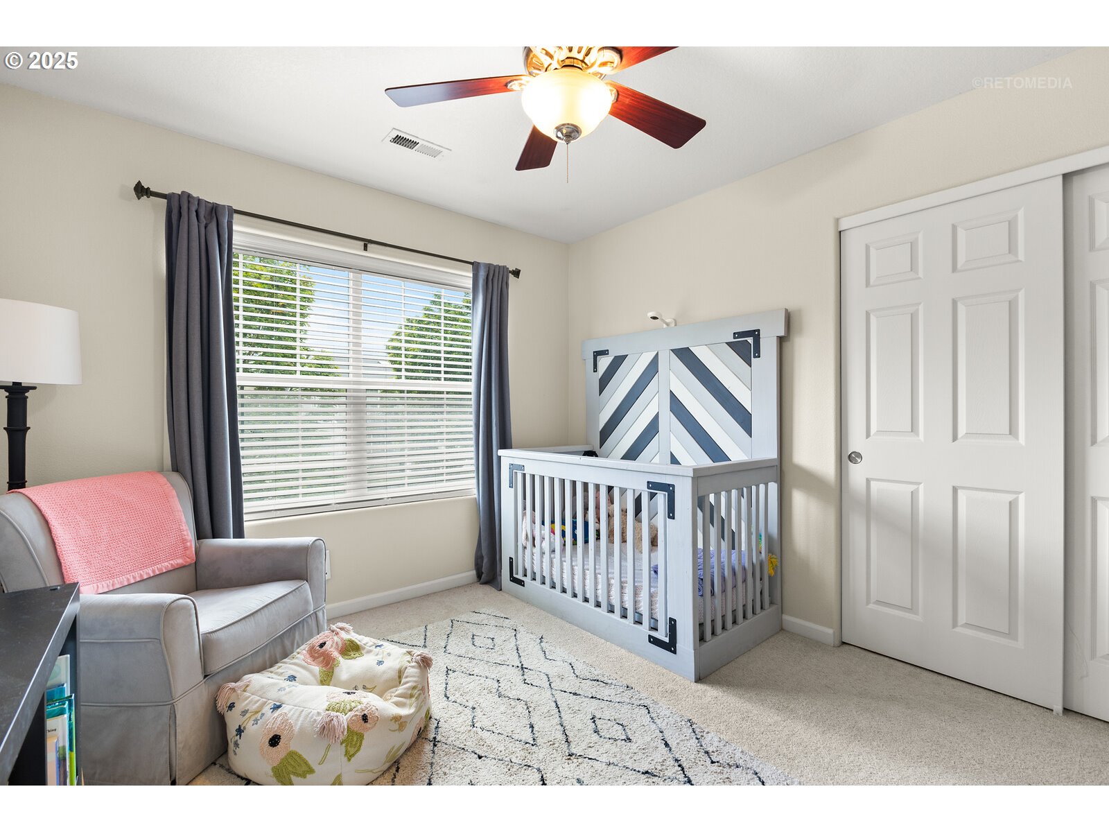20102 Southwest 54th Terrace Tualatin, OR 97062 - Photo 23 of 35 a bedroom with furniture and a window