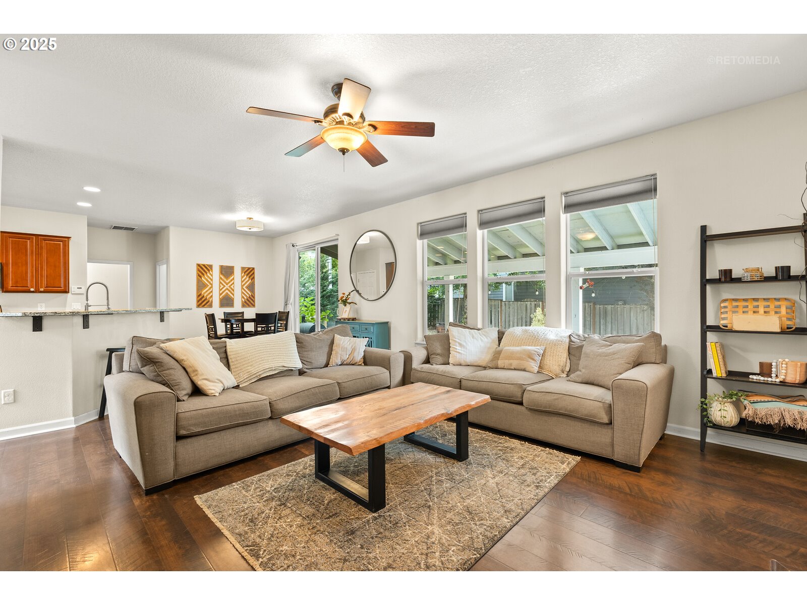 20102 Southwest 54th Terrace Tualatin, OR 97062 - Photo 7 of 35 a living room with furniture and a large window