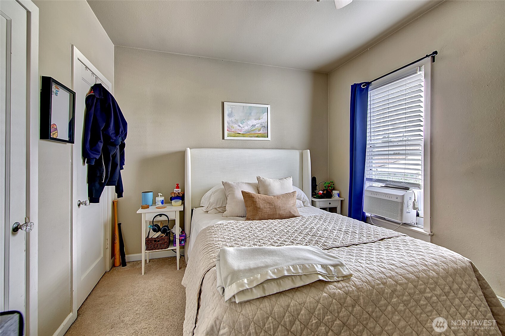 1018 Wall Street Everett, WA 98201 - Photo 12 of 20 a bedroom with a bed and a window